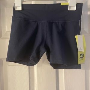NWT All In Motion navy blue tumble shorts. Size M (7-8)